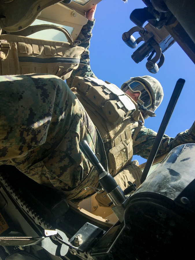 A Marine with Combat Logistics Battalion 25, Combat Logistics Regiment 45, 4th Marine Logistics Group, mounts a High Mobility Multipurpose Wheeled Vehicle before a convoy to Range 113, at Marine Corps Air Ground Combat Center Twentynine Palms, California, June 9, 2018. During Integrated Training Exercise 4-18, CLB-25 Marines took part in MOT to further their experience with crew-served weapons employment, improvised explosive device immediate action drills and establishment of a Helicopter Landing Zone.