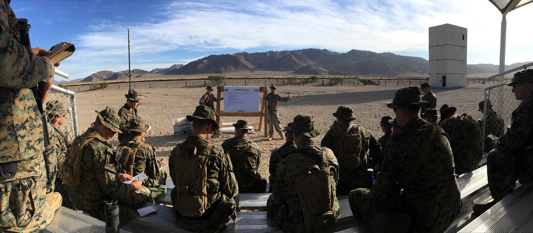 Marines with Combat Logistics Battalion 25, Combat Logistics Regiment 45, 4th Marine Logistics Group, receive instruction from “coyotes” on crew-served weapons employment while engaging enemy targets from a static mounted position, aboard Marine Corps Air Ground Combat Center Twentynine Palms, California, June 10, 2018. During Integrated Training Exercise 4-18, CLB-25 Marines took part in MOT to further their experience with crew-served weapons employment, improvised explosive device immediate action drills and establishment of a Helicopter Landing Zone.
