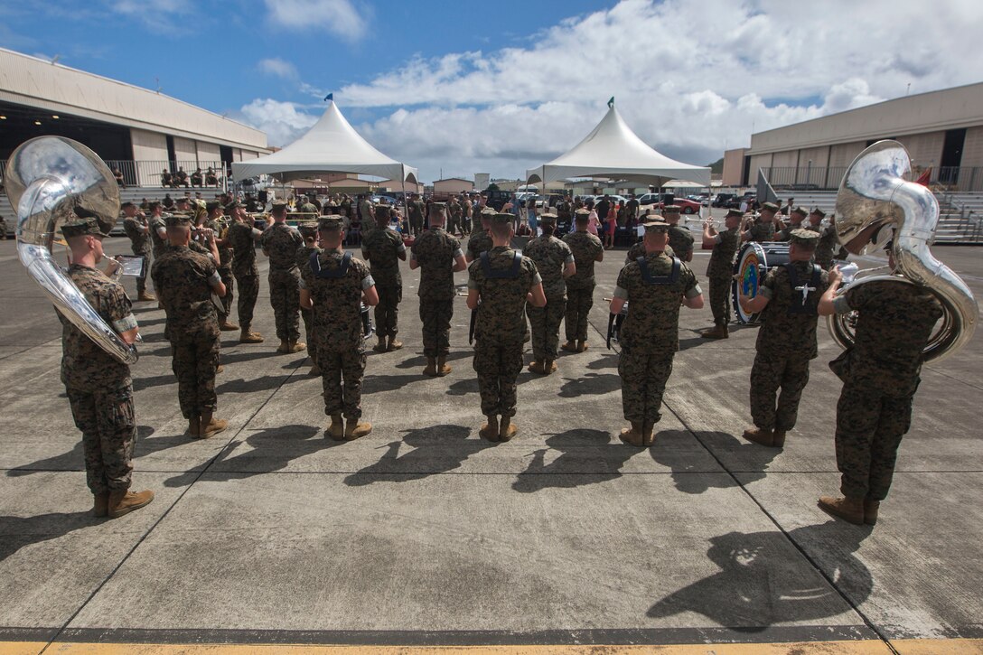 The Marine Corps Forces, Pacific Band performs during a change of command ceremony, Marine Corps Air Station Kaneohe Bay, Marine Corps Base Hawaii, June 7, 2018. Lt. Col. Kenneth Phelps retired and relinquished command of Marine Unmanned Aerial Vehicle Squadron 3 to Lt. Col. Peter Ban. (U.S. Marine Corps photo by Lance Cpl. Matthew Kirk)