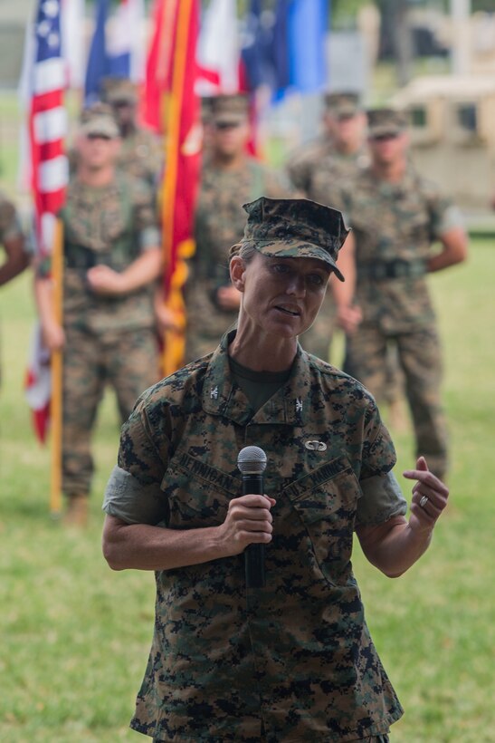 U.S. Marine Corps Col. Maura Hennigan, commanding officer, Combat Logistics Regiment 3, speaks to service members and families during a change of command ceremony, Marine Corps Base Hawaii, June 8, 2018. Lt. Col. Bolivar Pluas relinquished command of Combat Logistics Battalion 3 to Lt. Col. Paul Goguen. (U.S. Marine Corps photo by Lance Cpl. Matthew Kirk)