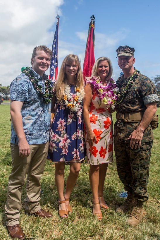 U.S. Marine Corps Lt. Col. Paul Goguen and his family pose for a photo following a change of command ceremony, Marine Corps Base Hawaii, June 8, 2018. Lt. Col. Bolivar Pluas relinquished command of Combat Logistics Battalion 3 to Goguen. (U.S. Marine Corps photo by Lance Cpl. Matthew Kirk)