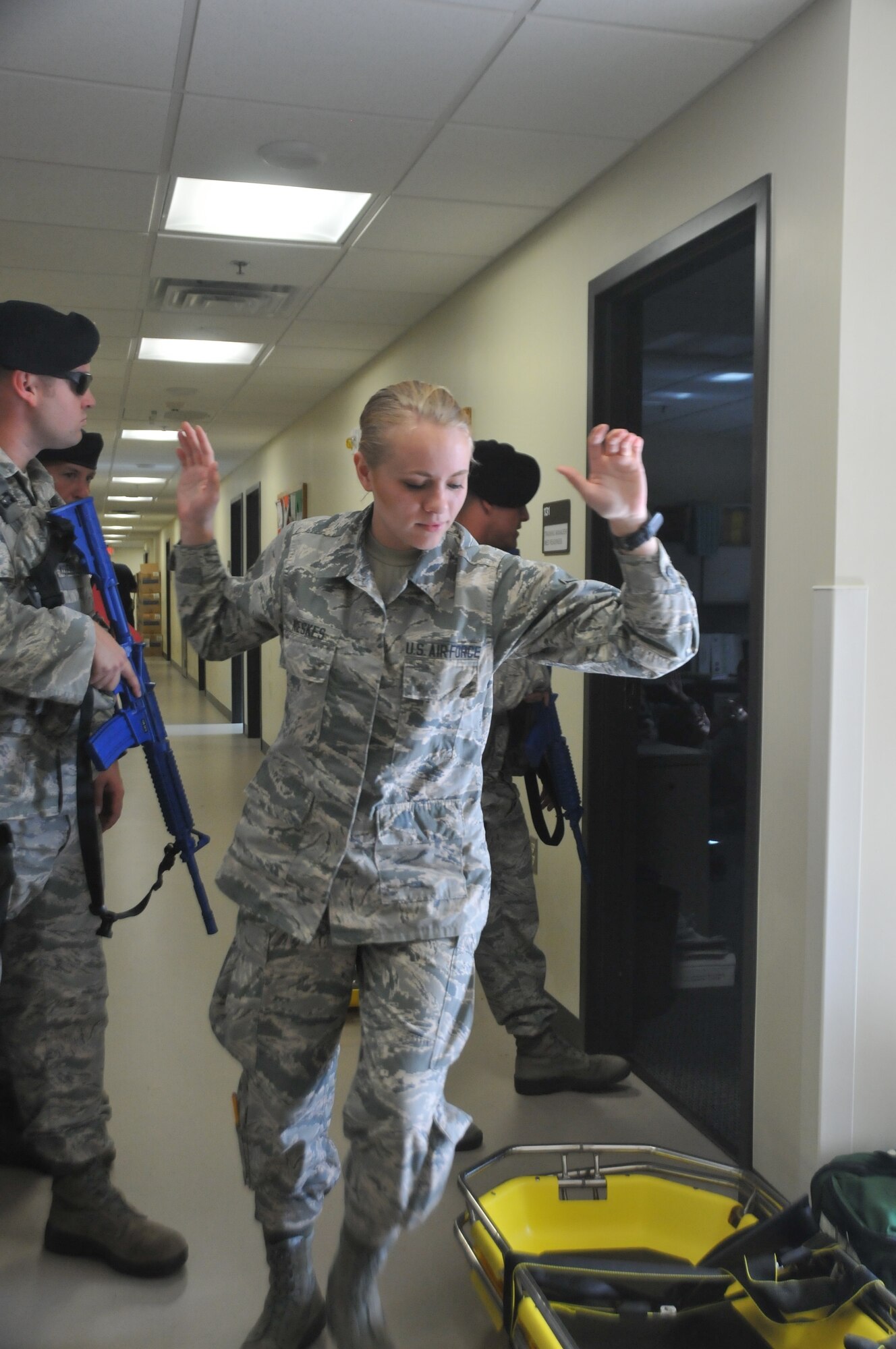 Security Forces with the 128th Air Refueling Wing, Wisconsin Air National Guard, evacuate Airmen during an active shooter exercise Aug. 13, 2017.