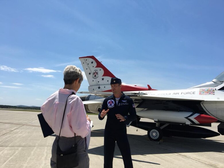 Maj. Branden Felker, advance pilot and narrator for the U.S. Air Force Thunderbirds, interviews with media June 12 on Westover’s flightline.  This will be the first time in 10 years that the Air Force's official aerial demonstration team has performed at Westover.