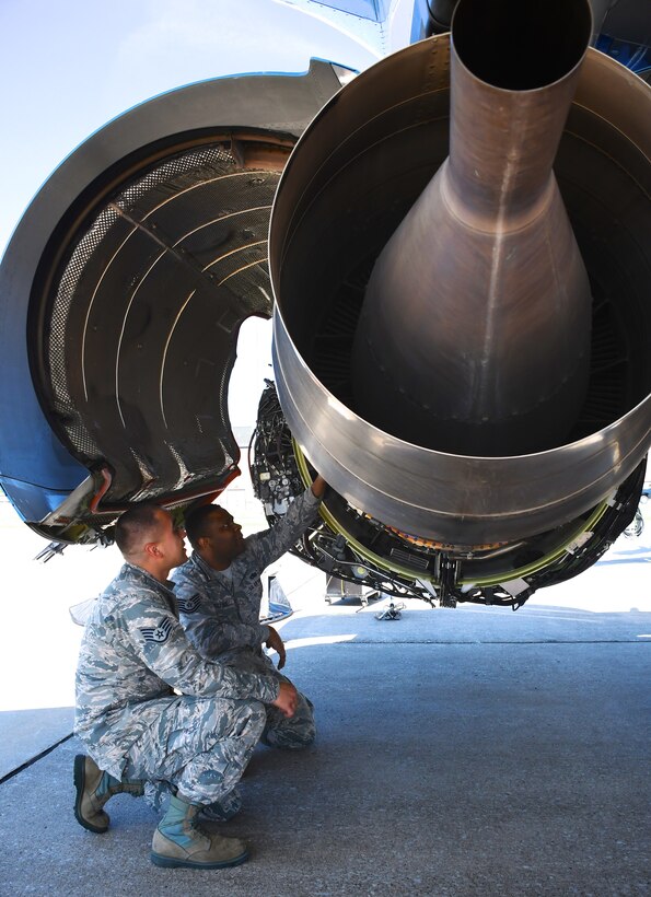 Tech. Sgt. Kenis Wallace, 932nd Maintenance Group C-40 Maintenance Instructor, points to an open area of the engine to explain the parts layout for a visitor on May 8, 2018, at Scott Air Force Base, Ill.  According to Wallace, "Here at the 932nd Maintenance Group, we provide maintenance training for all of the units that fly the C-40, including active, guard and reserve."  

This time around the 932nd Airlift Wing had five flying crew chiefs from the 15th AMXS at Hickam Air Force Base, and four from the 89th MXG located at Andrews Air Force Base.

"What we were doing was our Flying Crew Chief specialty course, during which we spend two weeks providing advanced training for Active Duty Flying Crew Chiefs. We provide training on scenarios and troubleshooting that may happen when they're out with an aircraft on the road (traveling)," said Wallace.  While a recent FOD (foreign object damage) walk was going on, 932nd MXG members were training their visiting guests on opening engine fan cowls and thrust reversers. 

"With the engines opened we trained component location and identification on the core of the engine," said Wallace.

He pays attention to detail every day in all conditions, no matter if it is the coldest day in the winter, or hottest day in summer, and enjoys his work at Scott Air Force Base.  "As far as what I love about my job, it is the people.  Maintainers work hard and play hard even when its hot and 100 degrees out and everyone is trying to get the job done, at the end of the day everyone is like your family and you can always have a laugh," Wallace added.

(U.S. Air Force photo by Lt. Col. Stan Paregien)