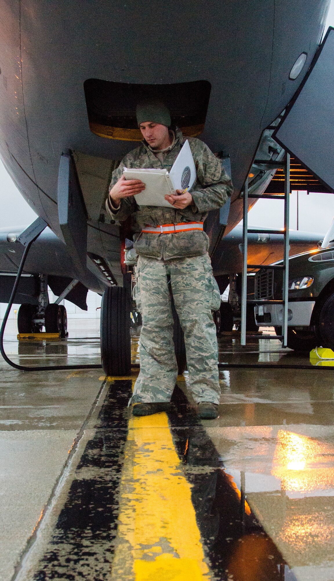 An Airmen reviews a pre-flight instruction binder during a generation exercise at the 128th Air Refueling Wing, Wisconsin Air National Guard, Nov. 4, 2017.