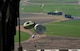 A container delivery system bundle falls to the ground after dropping out of a C-17 Globemaster III during Exercise Rainier War at the Rainier Drop Zone near Moses Lake, Wash., June 6, 2018. The purpose of exercise was to highlight the C-17’s capabilities to perform the Air Force’s core competencies of rapid global mobility and precision engagement. (U.S. Air Force photo by Senior Airman Tryphena Mayhugh)