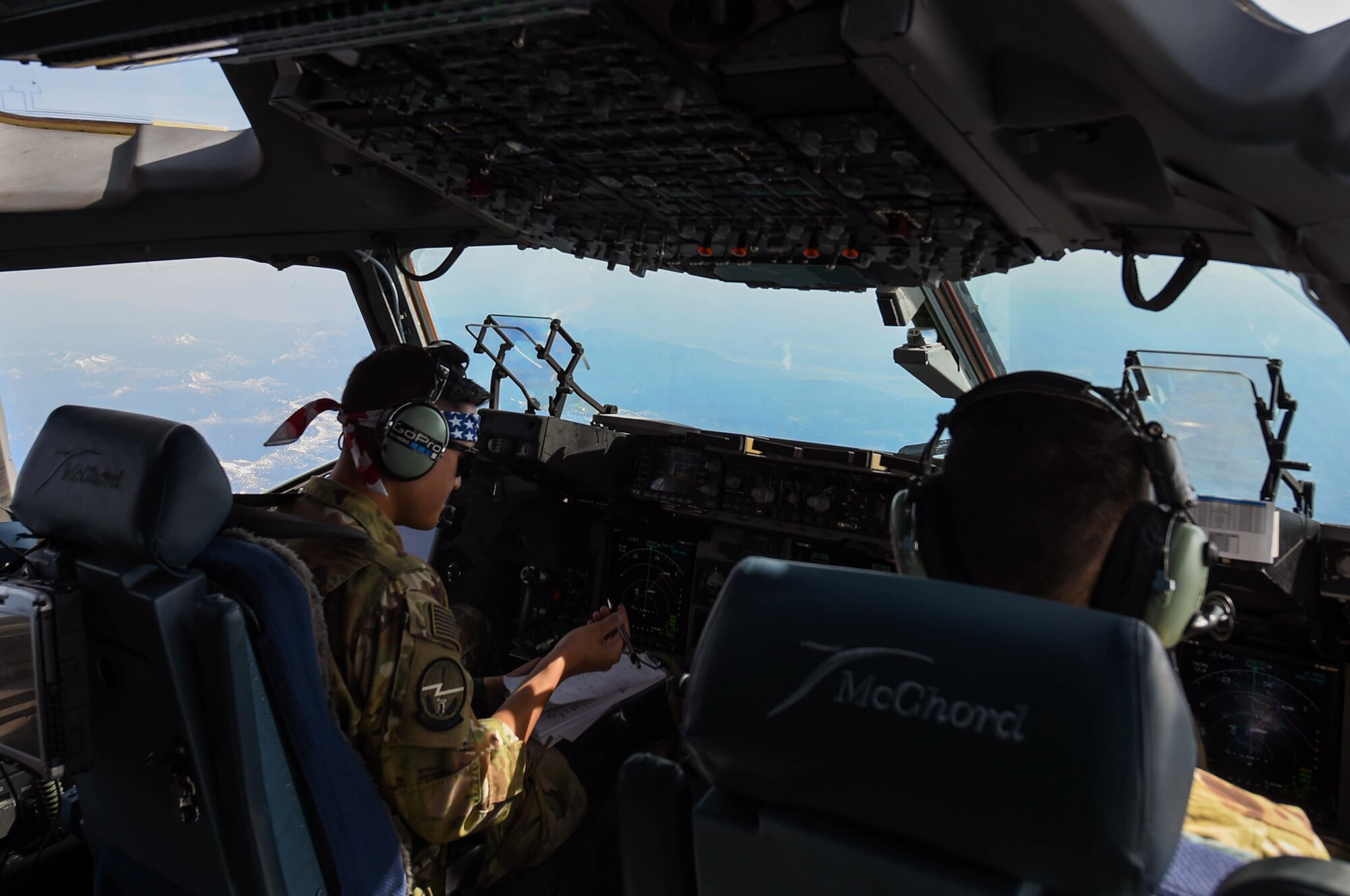 Capt. Tate Montgomery, 7th Airlift Squadron pilot, flies a C-17 Globemaster III near Moses Lake, Wash., June 6, 2018. Montgomery was participating in Exercise Rainier War, which provided insights on how to better execute a tactical scenario for possible future conflicts. (U.S. Air Force photo by Senior Airman Tryphena Mayhugh)