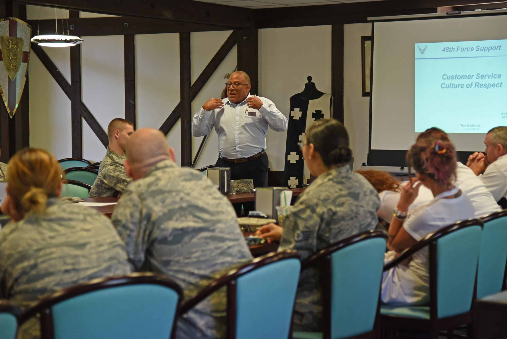Airmen from the 161st and 48th Force Support Squadrons attend a customer service training course inside the Knights Table dining facility at Royal Air Force Lakenheath, England May 23, 2018. The 161st FSS Airmen spent two weeks training with members of the 48th FSS to gain valuable insight and knowledge of how daily operations are conducted at an overseas air base. (U.S. Air National Guard photo by Staff Sgt. Dillon Davis)