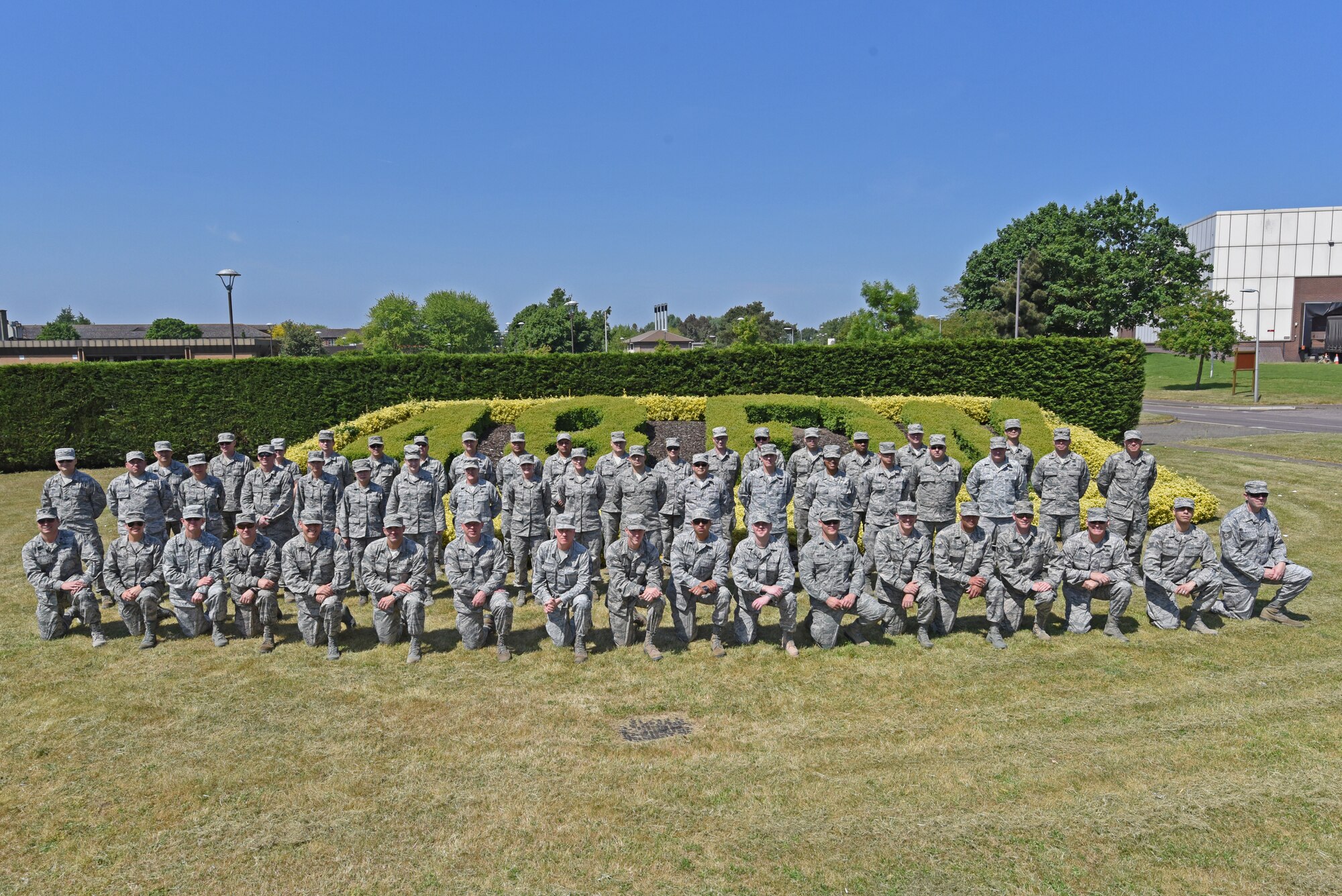 Airmen from the Arizona Air National Guard's 161st Air Refueling Wing pose for group photo at Royal Air Force Lakenheath, England May 24, 2018. The 161st ARW Airmen spent two weeks training alongside their counterparts form the 48th Fighter Wing to improve mission preparedness as well as gain valuable insight into what daily operations consist of while on active duty overseas. (U.S. Air National Guard photo by Staff Sgt. Dillon Davis)