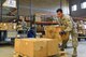 Senior Airman Bruno Iglesia, from the 161st Logistics Readiness Squadron, loads boxes onto a pallet during a two-week training exercise at Royal Air Force Lakenheath, England May 29, 2018. The training exercise allowed members from Arizona Air National Guard an opportunity to work alongside their active-duty counterparts from the 48th Fighter Wing to ensure mission readinesss. (U.S. Air National Guard photo by Staff Sgt. Dillon Davis)