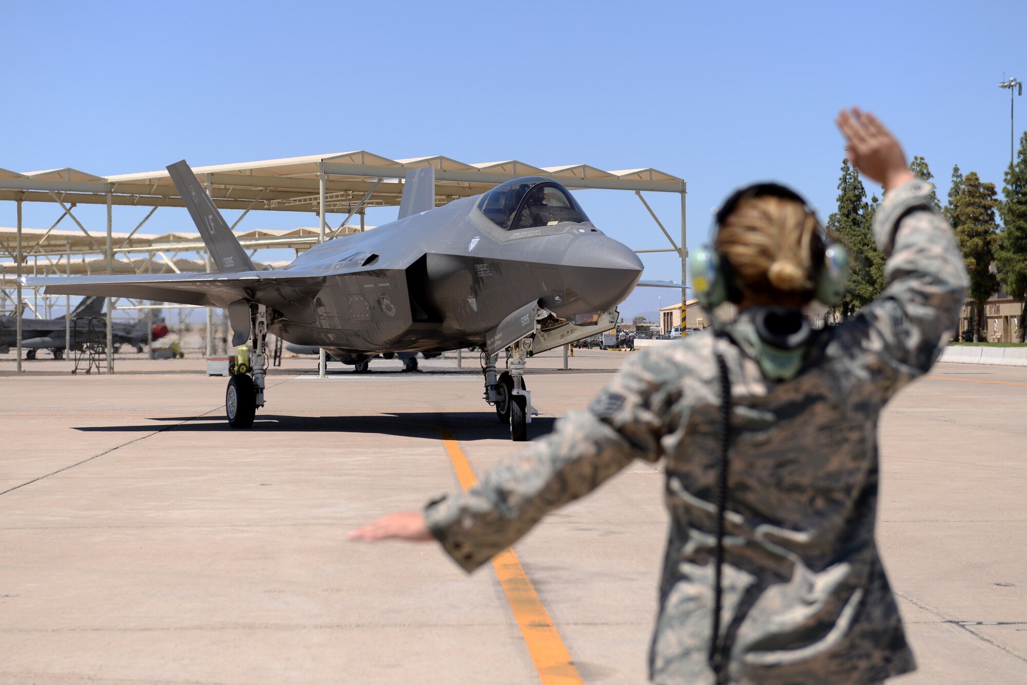 Brig. Gen. Brook Leonard, 56th Fighter Wing commander, taxis his F-35A Lightning II to rest before the celebration of his final sortie at Luke Air Force Base, Ariz., June 8, 2018. Leonard continuously flew sorties as an instructor pilot throughout his time as commander of Luke directly contributing to its mission of building the future of airpower. (U.S. Air Force photo by Senior Airman Ridge Shan)