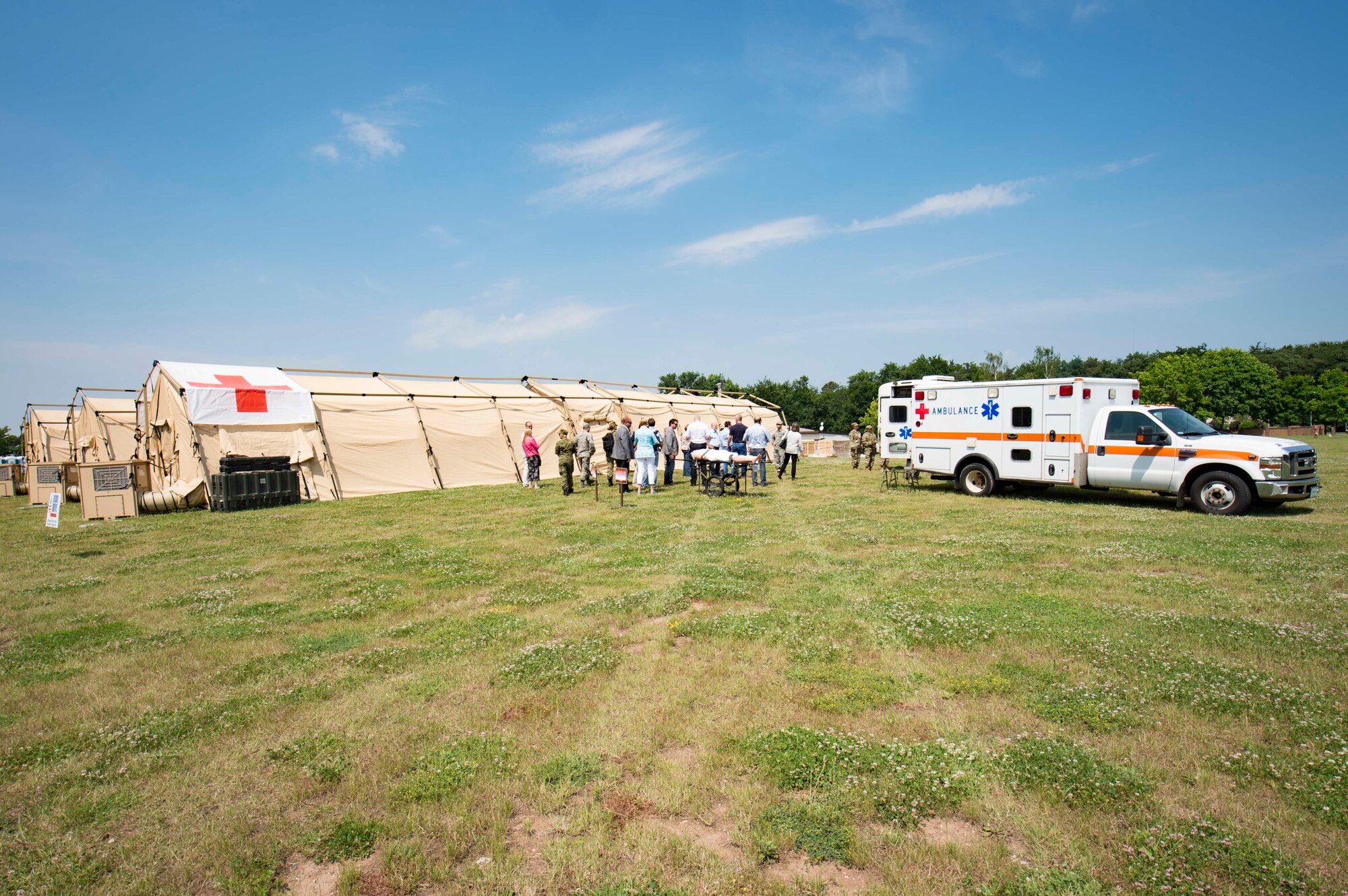 An assembled Expeditionary Medical Support System during Exercise Maroon Surge on Ramstein Air Base, Germany, June 7, 2018. Distinguished host nation visitors observed Airmen from the 86th Medical Group lead simulated ambulance loading and unloading with partner nation forces. The visitors also received a tour of an EMEDS, from the diagnosis room to the surgery room. (U.S. Air Force photo by Senior Airman Elizabeth Baker)