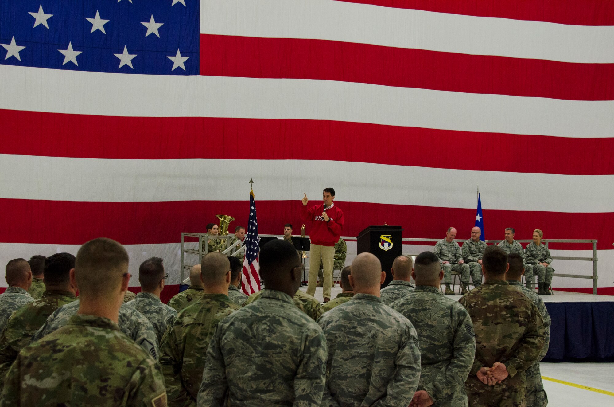 Governor Scott Walker, governor of Wisconsin, addresses deploying Airmen with the 128th Air Refueling Wing, Wisconsin Air National Guard, during a sendoff ceremony at General Mitchell Airfield in Milwaukee, Wisconsin, Dec. 2, 2017.