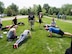 Thomson Reuters employees perform pushups. (Air Force Photo/Paul Zadach)