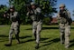U.S. Air Force Airmen assigned to the 633rd Security Forces Squadron performs muscle memory drills during an emergency services team tryouts at Joint Base Langley-Eustis, Virginia, June 8, 2018. The five first responders learned and practiced squad movement tactics and communication drills to become more effective team members. (U.S. Air Force photo by Senior Airman Derek Seifert)