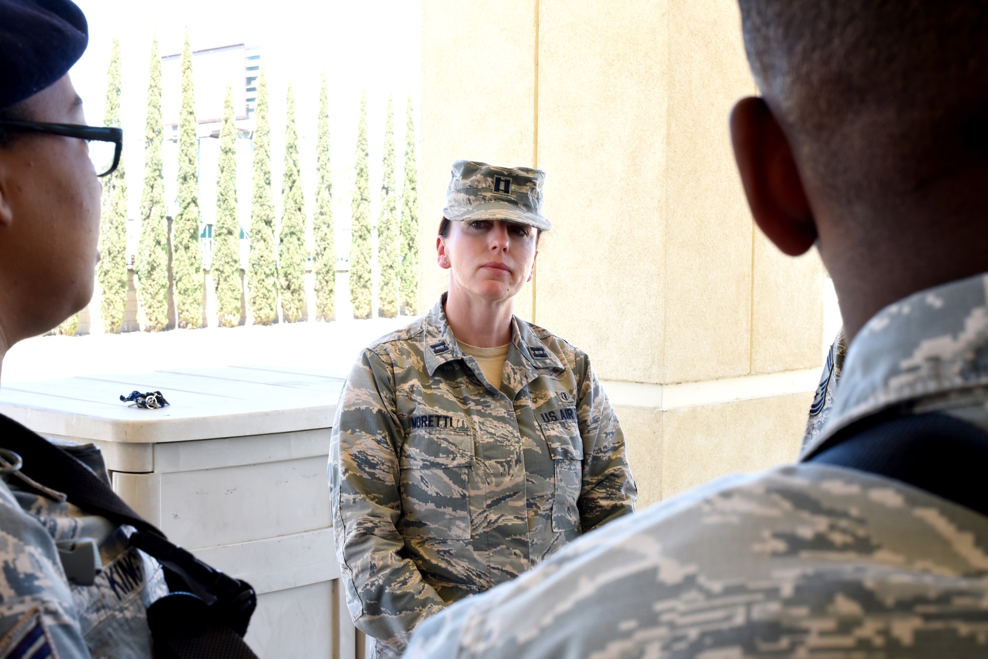 Capt. Malika Moretti, 60th Medical Operations Squadron clinical social worker, speaks to 60th Security Forces Squadron members June 11, 2018, at the main gate at Travis Air Force Base, Calif. (U.S. Air Force photo/Nick DeCicco)