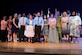 Project SEARCH graduates and leaders stand on stage in Fort Eustis’ Wylie Theater at Joint Base Langley-Eustis, Virginia, June 7, 2018. The ceremony celebrated the graduation of JBLE’s inaugural class, who are now prepared for the transition from school to a work environment. (U.S. Air Force photo by Airman 1st Class Monica Roybal)