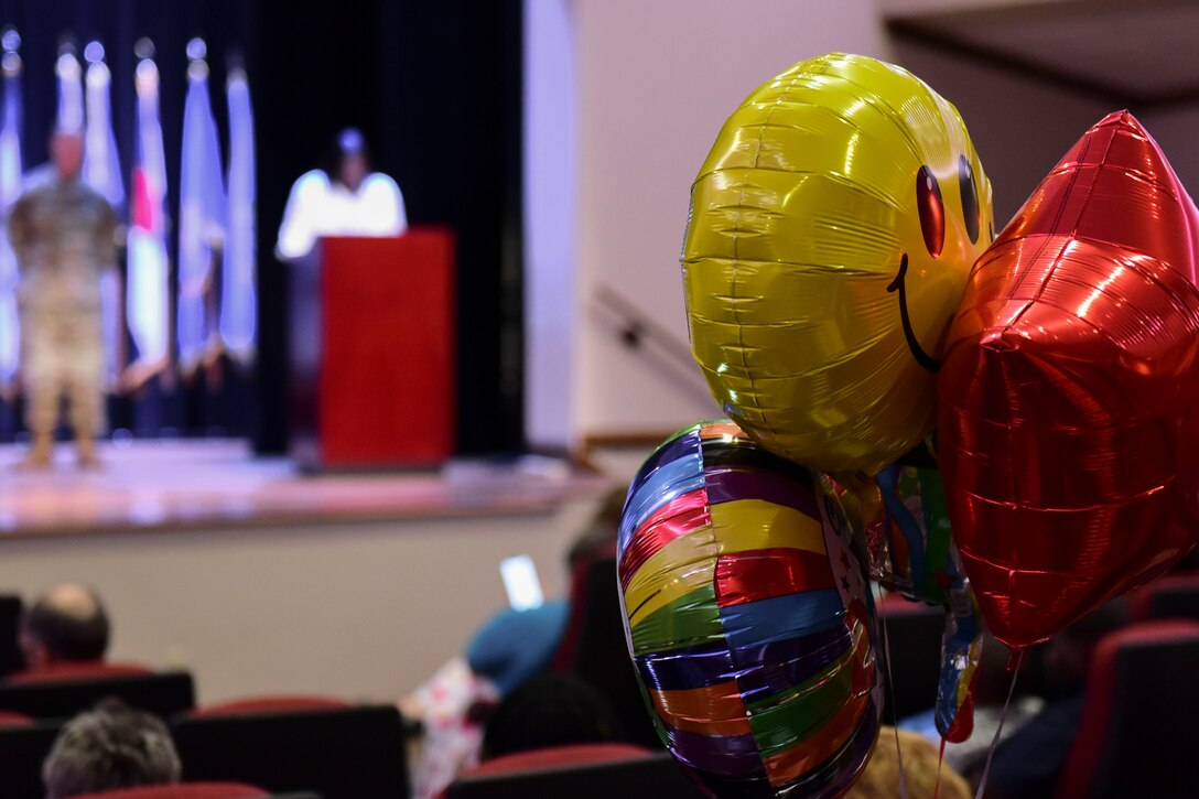 Graduation balloons float in Fort Eustis’ Wylie Theater at Joint Base Langley-Eustis, Virginia, June 7, 2018. Family, friends and coworkers gathered to celebrate JBLE’s first Project SEARCH graduation. (U.S. Air Force photo by Airman 1st Class Monica Roybal)