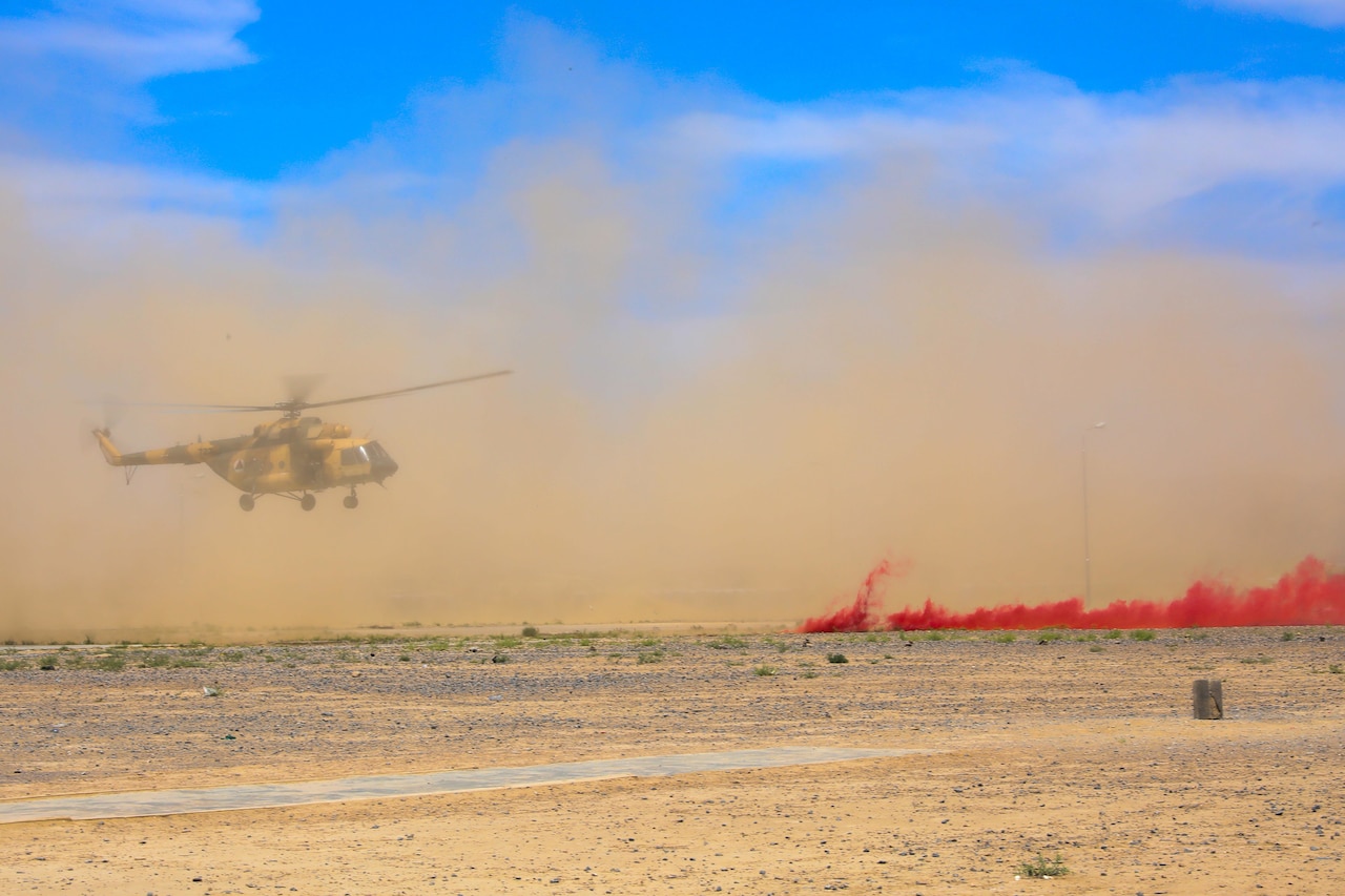An Mi-17 aircraft from the Afghan air force prepares to land at the Regional Military Training Center-Kandahar during a medical evacuation exercise.