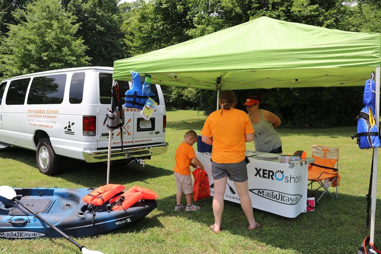Tennessee Kayak and Outdoor Company sets up a booth to explain about trips and tours they offer with safety in mind for the “Touch a Truck” event June 9, 2018 at Cordell Hull Lake in Carthage, Tenn. This was a cooperative event involving local businesses and agencies, state agencies and the Corps of Engineers. (USACE Photo by Ashley Webster)