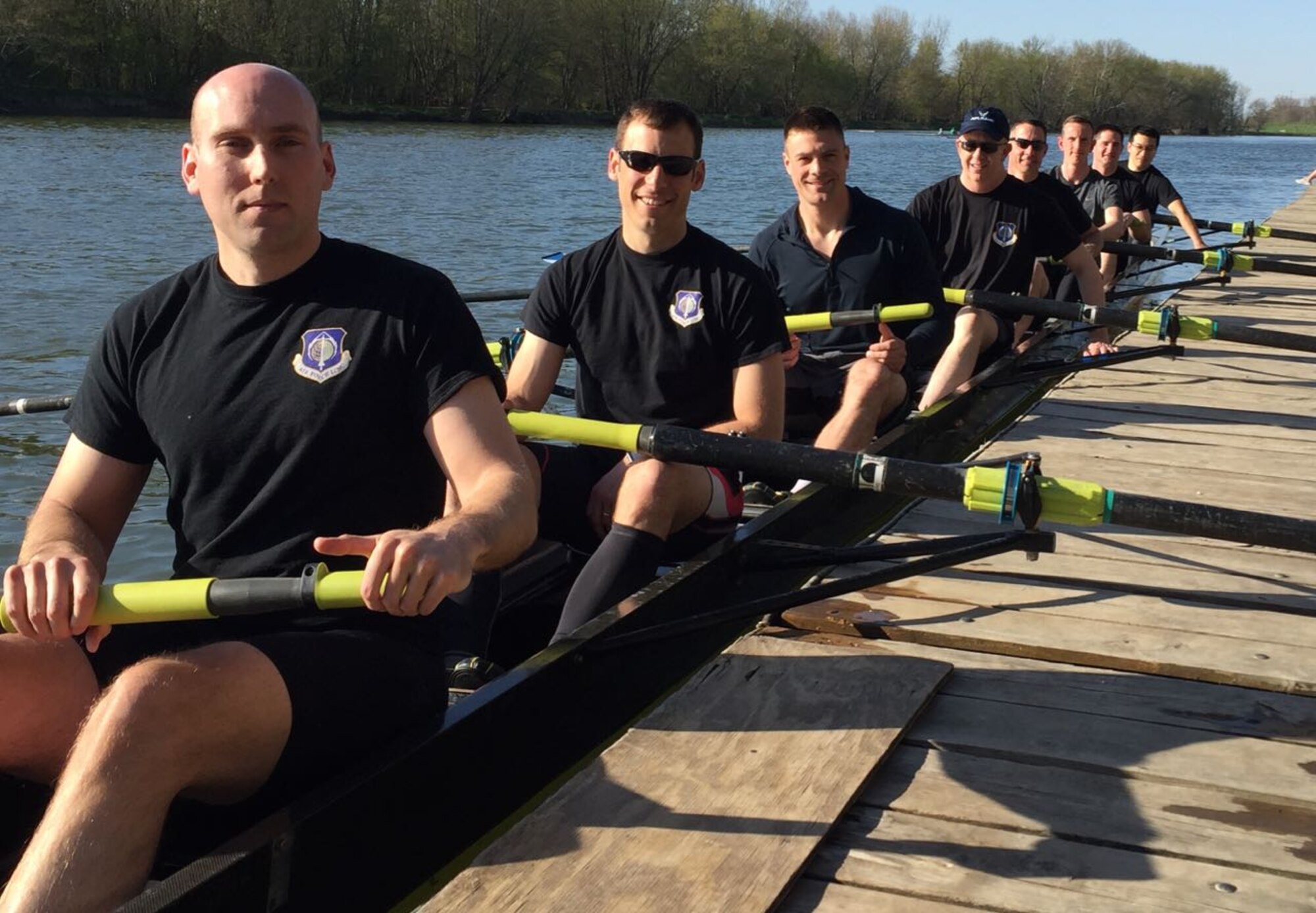 Members of an Air Force Life Cycle Management Center rowing team, pause before a competition. The group was inspired to form a team by the book ‘Boys in the Boat,’ which told the story of an “underdog” American rowing team that won the 1936 summer Olympics. (Courtesy photo)