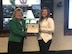 Nicole Tubbs (right), a Logistics Management PALACE Acquire Intern with the Air Force Life Cycle Management Center's Propulsion Directorate, receives a graduation certificate from Cynthia Abbott, Director of the AFLCMC Logistics Directorate. Tubbs successfully completed the two-year internship program (Courtesy photo)