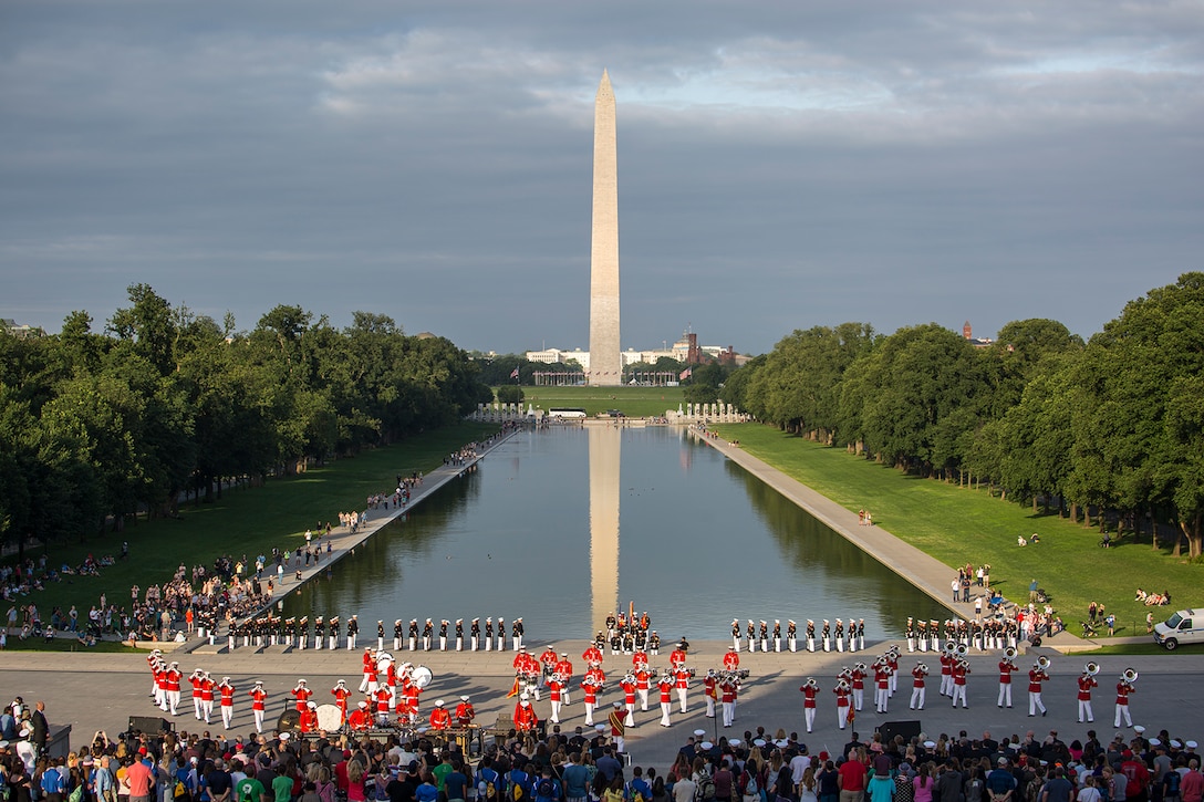 Marines with “The Commandant’s Own” Marine Drum & Bugle Corps perform a musical ballad during the Sunset Parade at the Lincoln Memorial, Washington D.C., June 12, 2018. This year is the first year the Barracks Marines are hosting Tuesday Sunset Parades at the Lincoln Memorial. The guest of honor for the parade was Secretary of the Interior Ryan Zinke and the hosting official was Robert D. Hogue, counsel for the commandant of the Marine Corps. (Official U.S. Marine Corps photo by Sgt. Robert Knapp/Released)