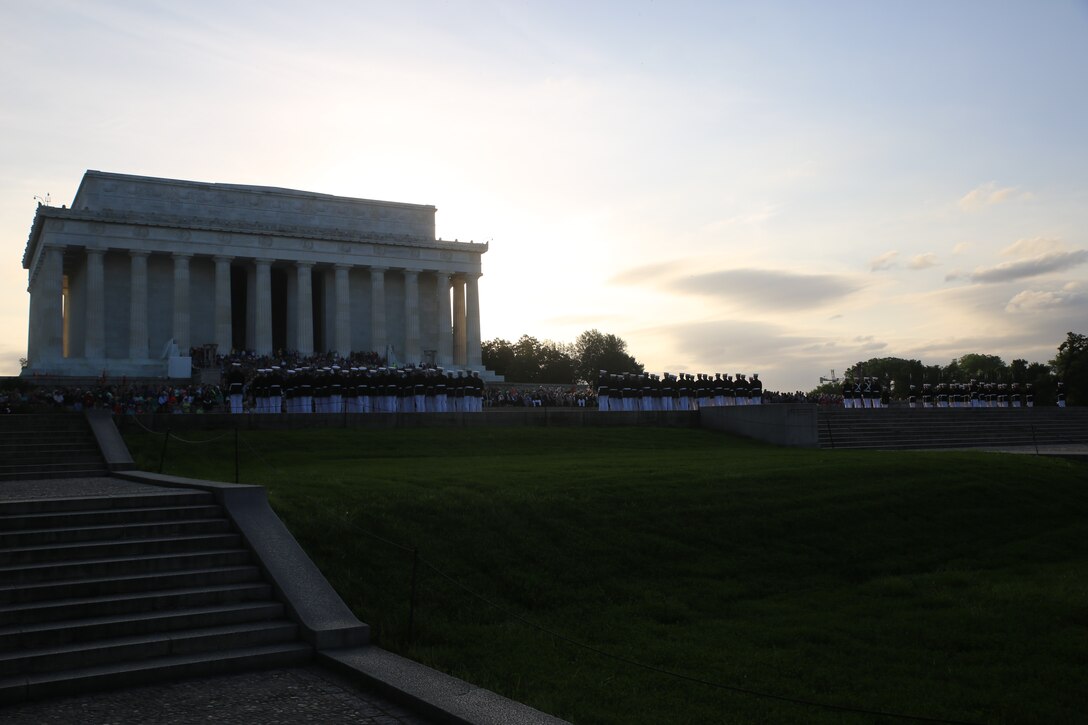Marines with Bravo Company, Marine Barracks Washington D.C., prepare to execute precision drill movements during the Sunset Parade at the Lincoln Memorial, Washington D.C., June 12, 2018. This year is the first year Barracks Marines are hosting Tuesday Sunset Parades at the Lincoln Memorial. The guest of honor for the parade was Secretary of the Interior Ryan Zinke and the hosting official was Robert D. Hogue, counsel for the commandant of the Marine Corps.