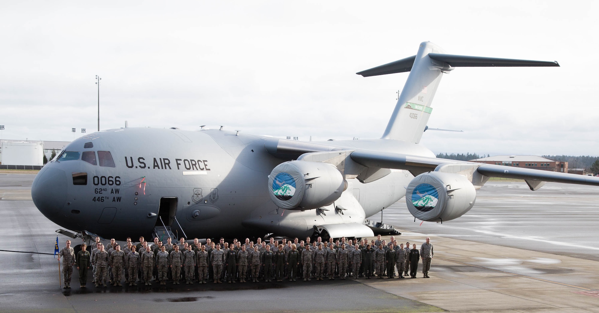 The 446th Airlift Wing Aeromedical Evacuation Squadron stands in formation in front of a C-17 Globemaster III. The squadron was recognized as the Air Force Reserve Command’s Squadron of the Year, Outstanding AFRC Aeromedical Aircrew Officer of the Year and Outstanding AFRC Aeromedical Aircrew SNCO of the Year. (U.S. Air Force photo by Tech. Sgt. Bryan Hull)