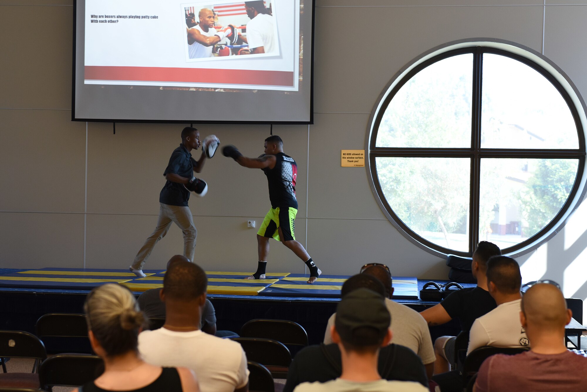 U.S. Air Force Staff Sgt. Pierre Johnson-Alexander, 39th Weapons System Security Group ammunition quality assurance inspector, and U.S. Air Force Senior Airman Deuderit Colon De Jesus 39th Operations Support Squadron airfield management shift lead, give a demonstration of modern boxing during a mixed martial arts workshop at Incirlik Air Base, Turkey, June 9, 2018.