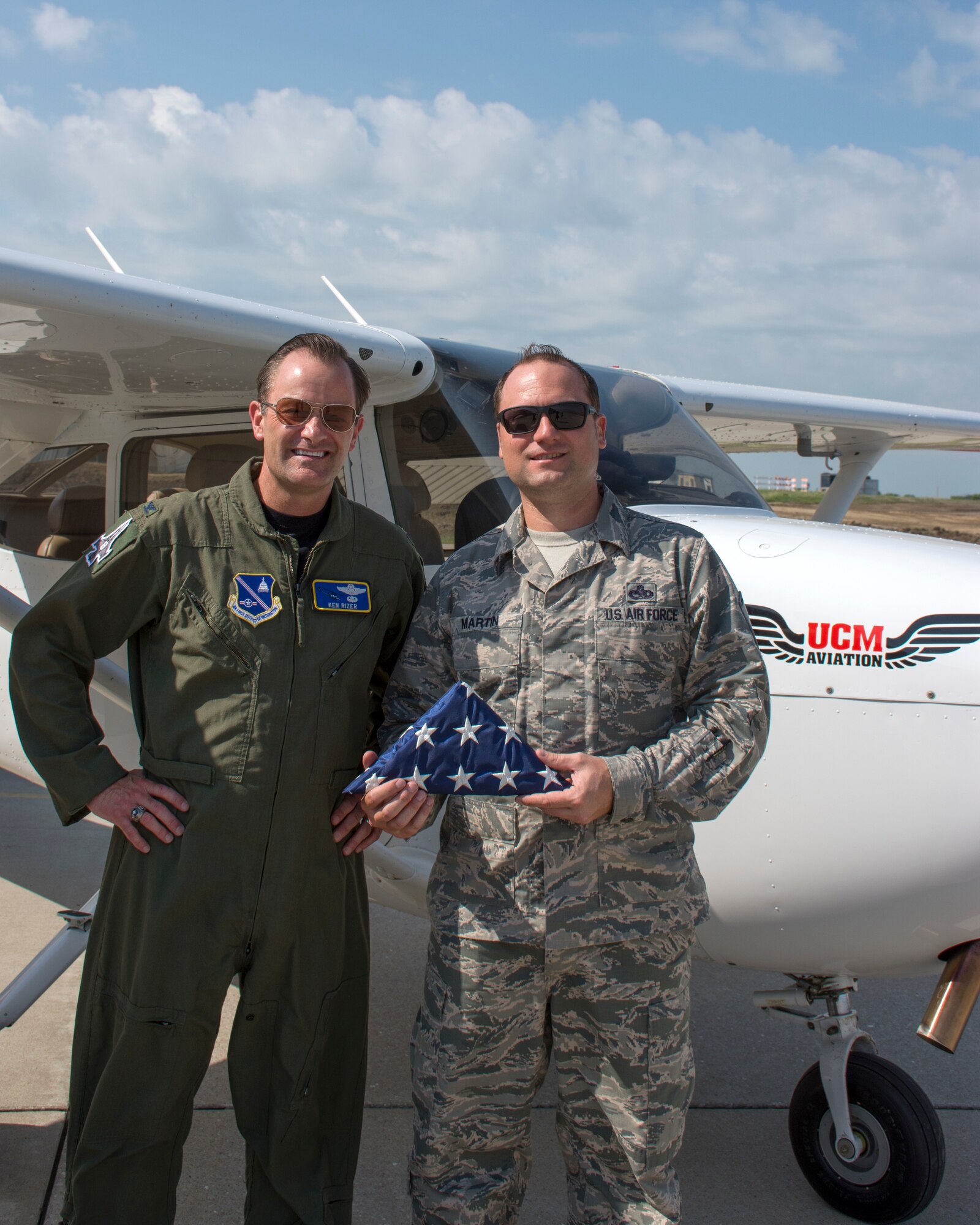 Retired Col. Ken Rizer and Master Sgt. Robert Martin stand preflight at SkyHaven Airport.