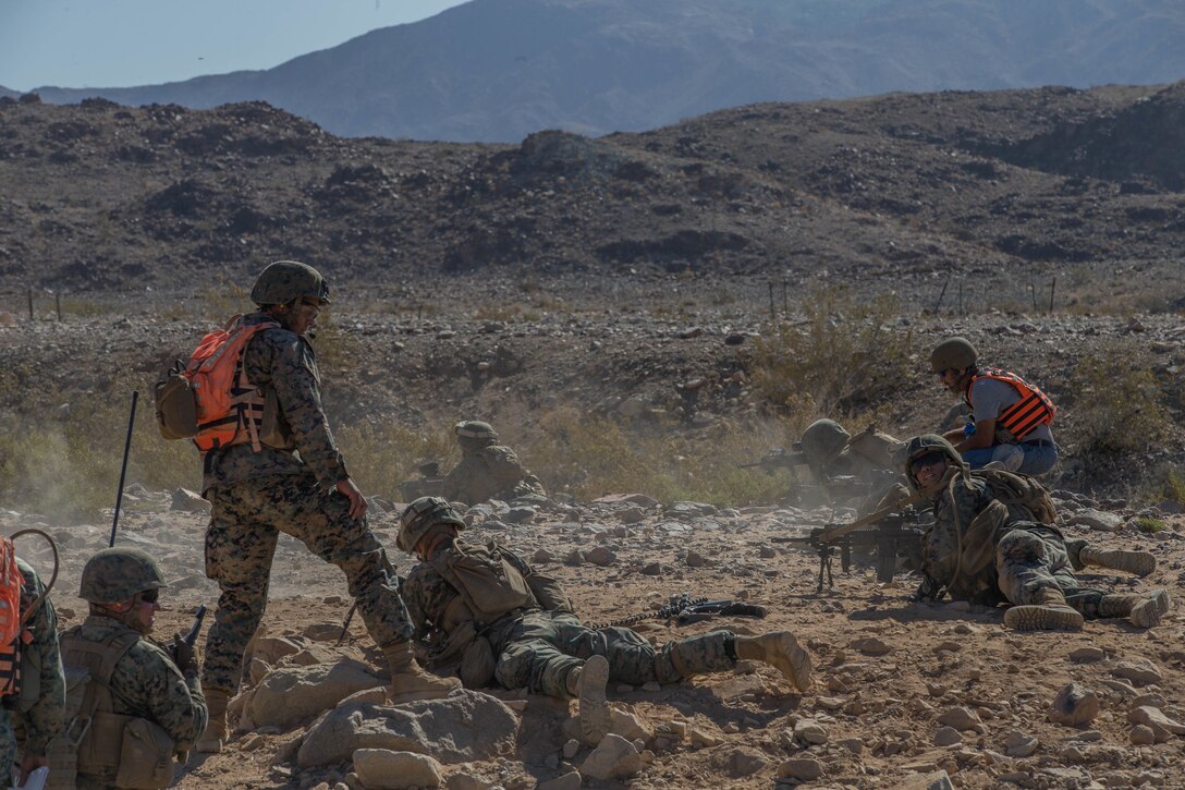 Marines with Alpha Company, 1st Battalion, 23rd Marine Regiment, 4th Marine Division, conduct live-fire drills on range 410A, a platoon reinforced attack range, during Integrated Training Exercise 4-18 at Marine Corps Air Ground Combat Center Twentynine Palms, California, June 11, 2018.