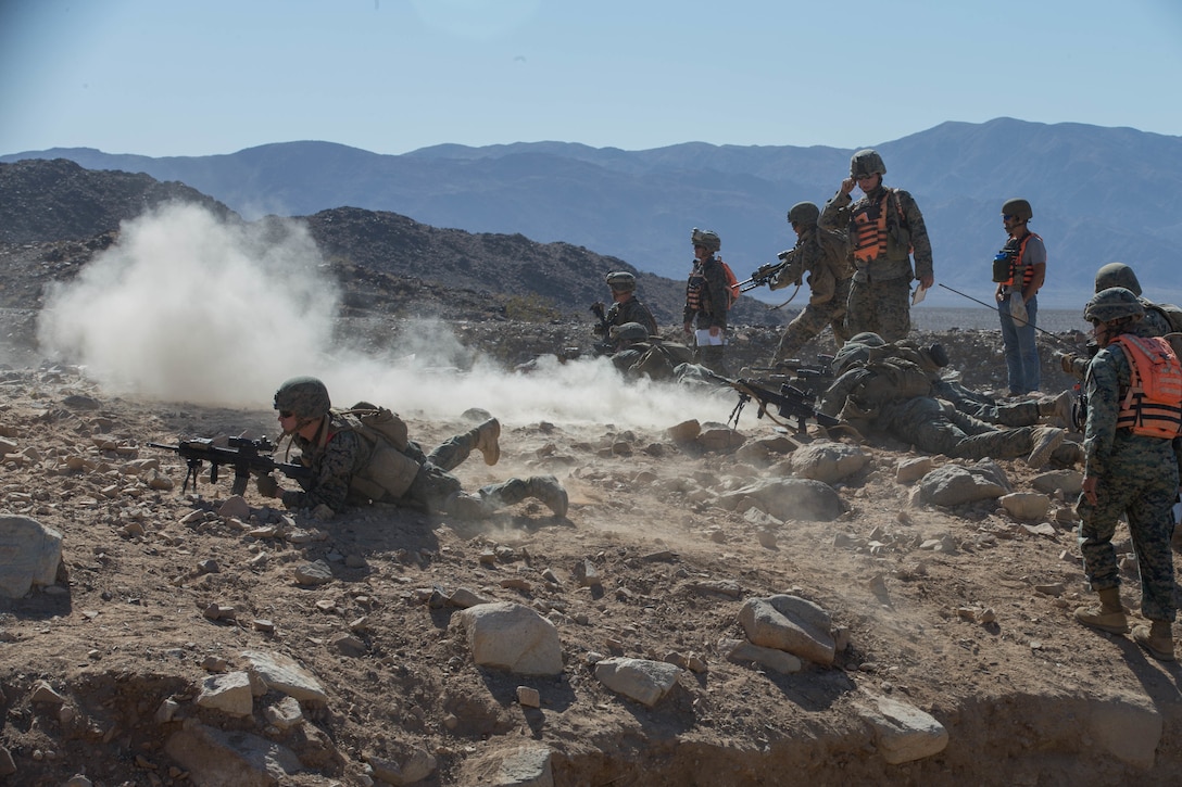 Marines with Alpha Company, 1st Battalion, 23rd Marine Regiment, 4th Marine Division, conduct live-fire drills on range 410A, a platoon reinforced attack range, during Integrated Training Exercise 4-18 at Marine Corps Air Ground Combat Center Twentynine Palms, California, June 11, 2018.