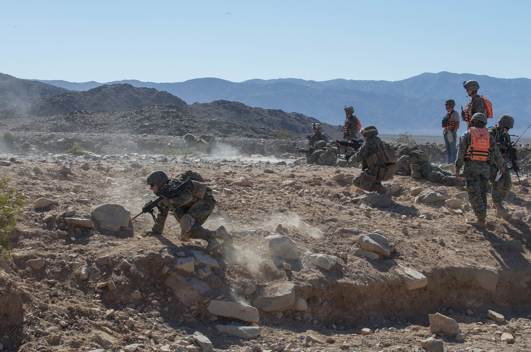 Marines with Alpha Company, 1st Battalion, 23rd Marine Regiment, 4th Marine Division, conduct live-fire drills on range 410A, a platoon reinforced attack range, during Integrated Training Exercise 4-18 at Marine Corps Air Ground Combat Center Twentynine Palms, California, June 11, 2018.