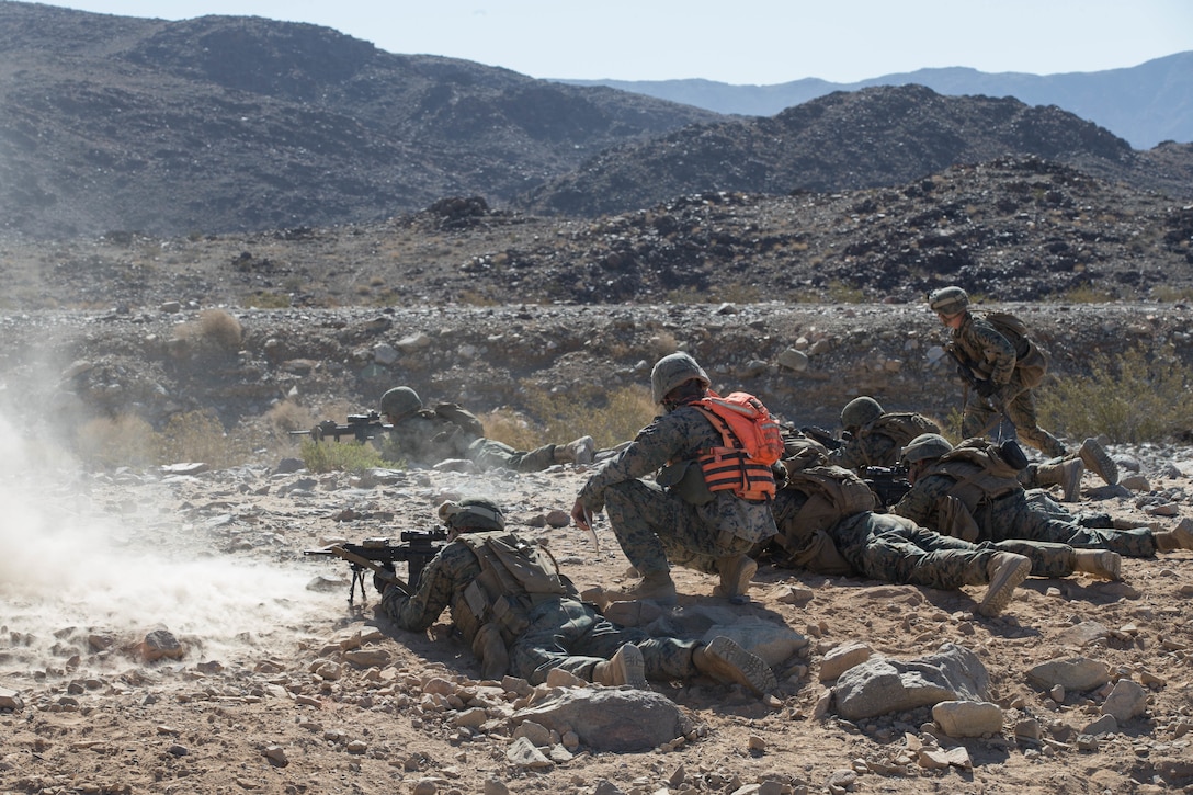Marines with Alpha Company, 1st Battalion, 23rd Marine Regiment, 4th Marine Division, conduct live-fire drills on range 410A, a platoon reinforced attack range, during Integrated Training Exercise 4-18 at Marine Corps Air Ground Combat Center Twentynine Palms, California, June 11, 2018.