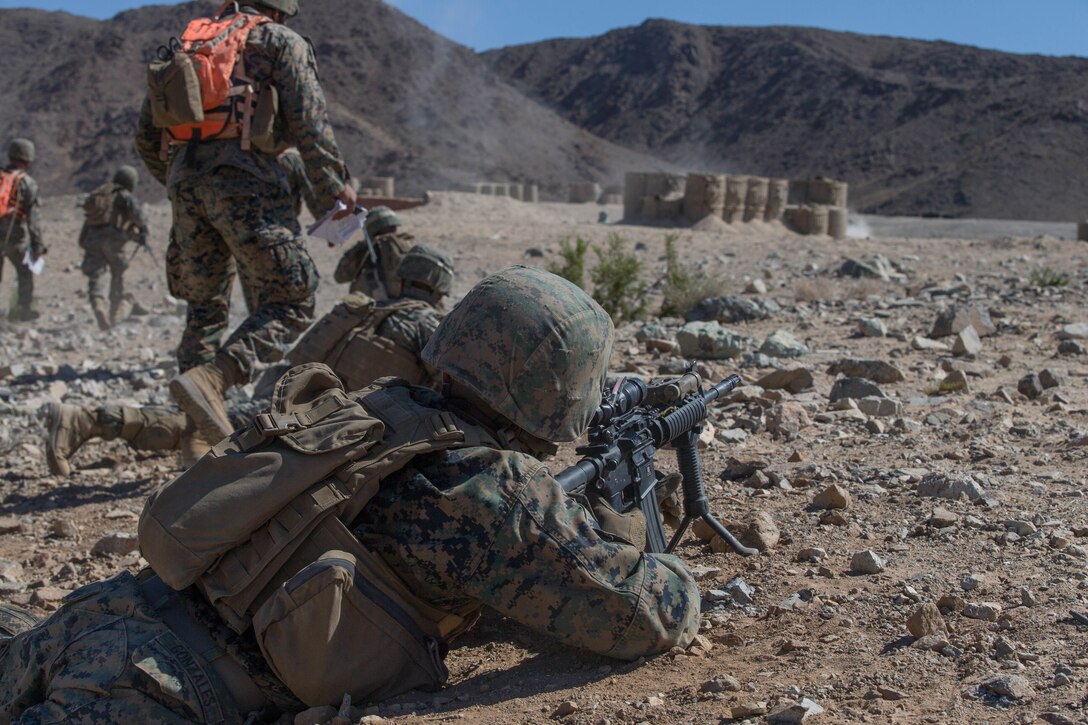Marines with Alpha Company, 1st Battalion, 23rd Marine Regiment, 4th Marine Division, conduct live-fire drills on range 410A, a platoon reinforced attack range, during Integrated Training Exercise 4-18 at Marine Corps Air Ground Combat Center Twentynine Palms, California, June 11, 2018.