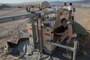 Staff Sgt. Lucas White, an engineer equipment electrical systems technician with Maintenance Company, Combat Logistics Battalion 451, Combat Logistics Regiment 45, 4th Marine Logistics Group, Lance Cpl. Eli Sommers, a refrigeration and air conditioning technician with Utilities, CLR-45, 4th MLG, and Private First Class Sergio Gonzalez, a motor vehicle operator with CLB-451, CLR-45, 4th MLG, set up a floodlight during Integrated Training Exercise 4-18 at Marine Corps Air Ground Combat Center Twentynine Palms, California, June 12, 2018.