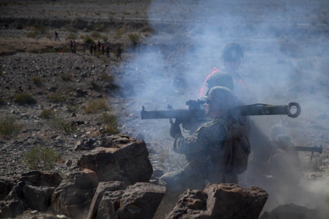 Infantry Assault Marines with Bravo Company, 1st Battalion, 23rd Marine Regiment, 4th Marine Division, fire the Shoulder-Launched Multipurpose Assault Weapon on range 410A, a platoon reinforced attack range, during Integrated Training Exercise 4-18 at Marine Corps Air Ground Combat Center Twentynine Palms, California, June 12, 2018.