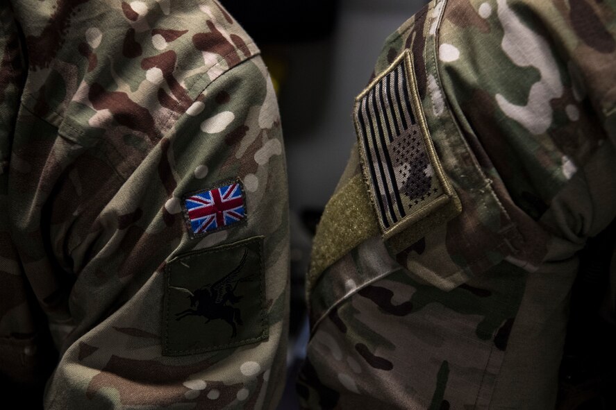 U.S. Army paratroopers assigned to the 82nd Airborne Division, Fort Bragg, N.C., and British Army paratroopers assigned to the 3rd Regiment Parachute Battalion C. Company, Colchester, England, prepare to jump from a C-17 Globemaster III over Latvia, during Exercise Swift Response 18 (SR18) June 8, 2018. SR18 is one of the premier military crisis response training events for multinational airborne forces in the world that demonstrates the ability of America's Global Response Force to work hand-in-hand with joint and total force partners. (U.S. Air Force photo by Airman First Class Gracie I. Lee)