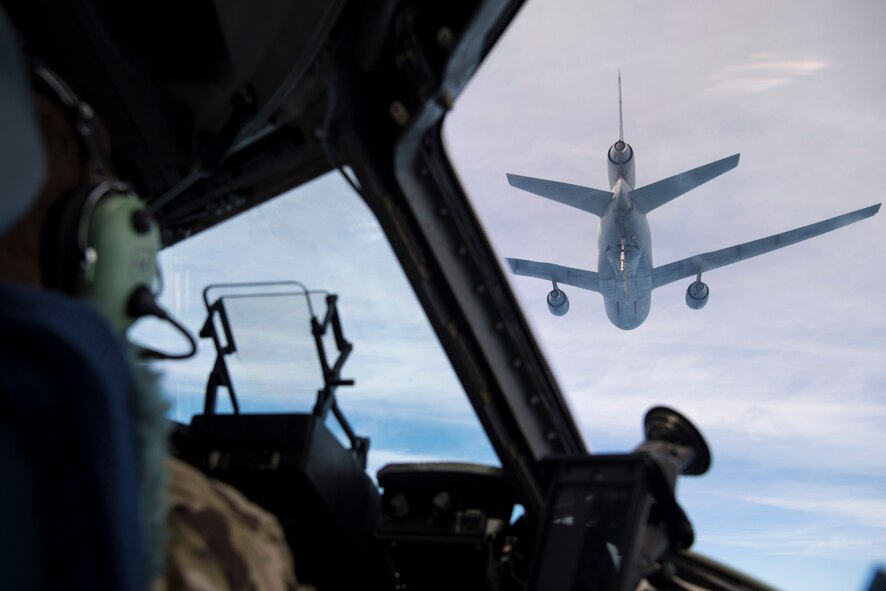 U.S. Air Force Lt. Col. Michael B. Lewis and 1st Lt. Douglas Urbino, pilots, assigned to the 15th and 16th Airlift Squadrons, Joint Base Charleston, S.C., pilot a C-17 Globemaster III during an air-refueling  during Exercise Swift Response 18 (SR18) June 8, 2018. SR18 is one of the premier military crisis response training events for multinational airborne forces in the world that demonstrates the ability of America's Global Response Force to work hand-in-hand with joint and total force partners. (U.S. Air Force photo by Airman First Class Gracie I. Lee)
