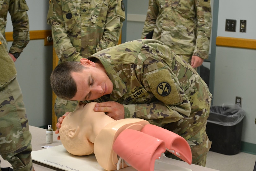 Sgt. 1st Class Stephen Maynard, an Army Reserve Soldier assigned to Regional Training Site – Maintenance Fort Devens, demonstrated one of the combat life-saving techniques during the German Armed Forces Proficiency Badge event at Fort Indiantown Gap, Penn. June 1-3. Maynard was one of more than 75 Soldiers and Airmen who tried to earn the badge for military proficiency. (U.S. Army Reserve photo by Sgt. 1st Class Emily Anderson, 80th Training Command)