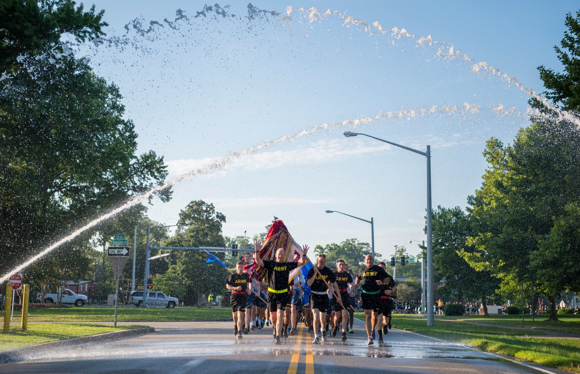 U.S. Army Col. Ralph L. Clayton, 733rd Mission Support Group commander, front-left, leads service members during the Army 243rd Birthday Run Celebration at Joint Base Langley-Eustis, Virginia, June 14, 2018.