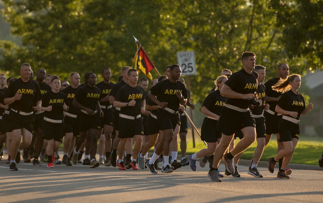 U.S. Army Soldiers run in formation during the Army 243rd Birthday Run Celebration at Joint Base Langley-Eustis, Virginia, June 14, 2018.
