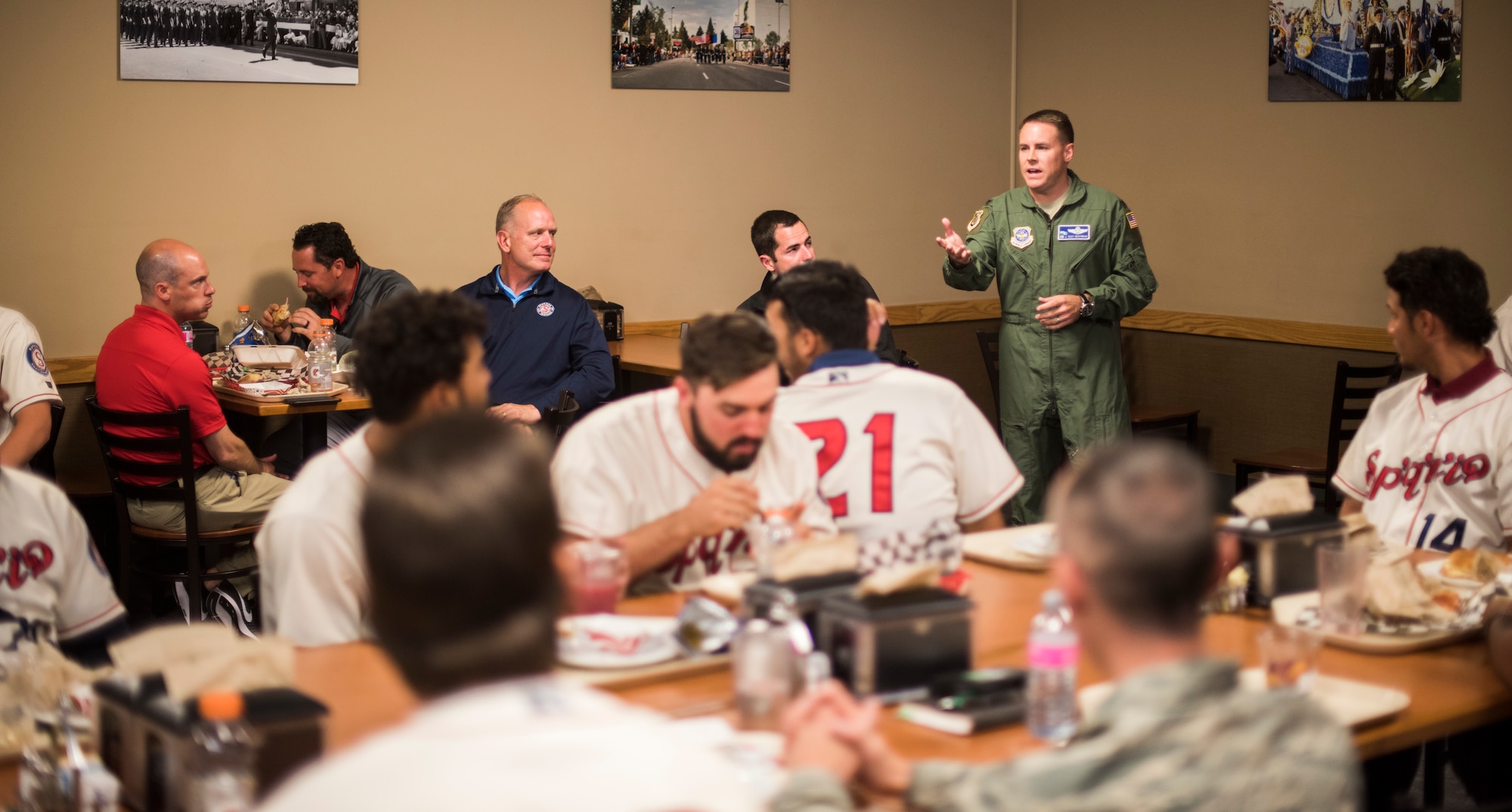 Col. Scot Heathman, 92nd Air Refueling Wing commander, talks with the Spokane Indians Baseball team about Team Fairchild and the military as a whole during their visit at Fairchild Air Force Base, Wash. June 12, 2018. Among lessons learned in communication and teamwork, the Indians learned how many young men and women who serve in today’s military are the same age as them; Airmen wear a uniform but play in a different arena. (U.S. Air Force photo/Senior Airman Sean Campbell)