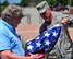 Charles Robert Johnson Jr. folds a 48-star flag with Maj. Scott Allen, 910th Airlift Wing chief of Public Affairs, on Flag Day, June 14, 2018, here.