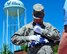 Reserve Citizen Airman Maj. Scott D. Allen, 910th Airlift Wing chief of Public Affairs, performs the final fold on a 48-star flag in front of the YARS water tower, June 14, 2018.