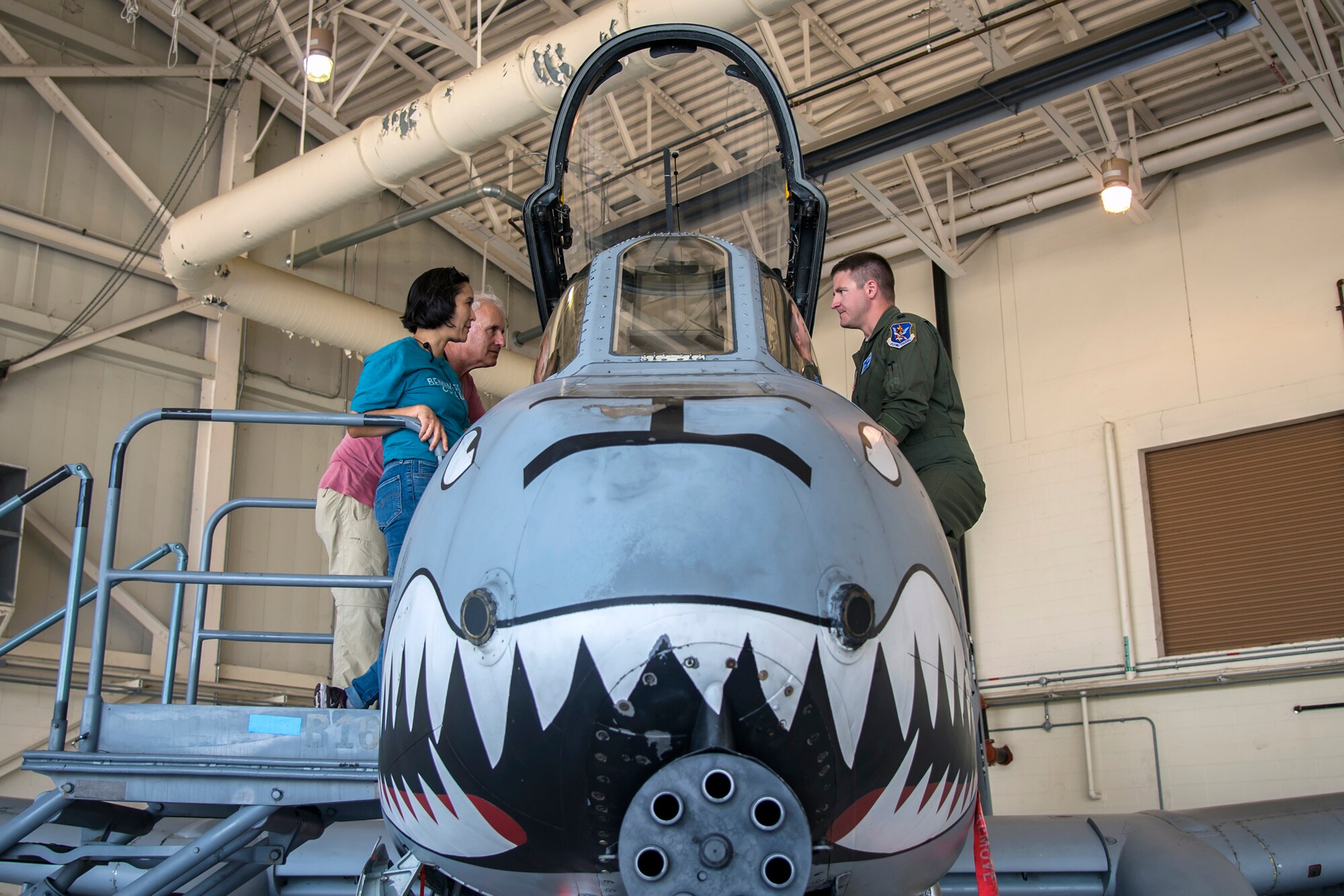 Members of the Joint Civilian Orientation Course 88 (JCOC), speak to an Airman from the 23d Fighter Group, June 13, 2018, at Moody Air Force Base, Ga. The mission of JCOC is to increase the public’s understanding of the military through engagements between the armed forces and course members. (U.S. Air Force photo by Airman 1st Class Eugene Oliver)