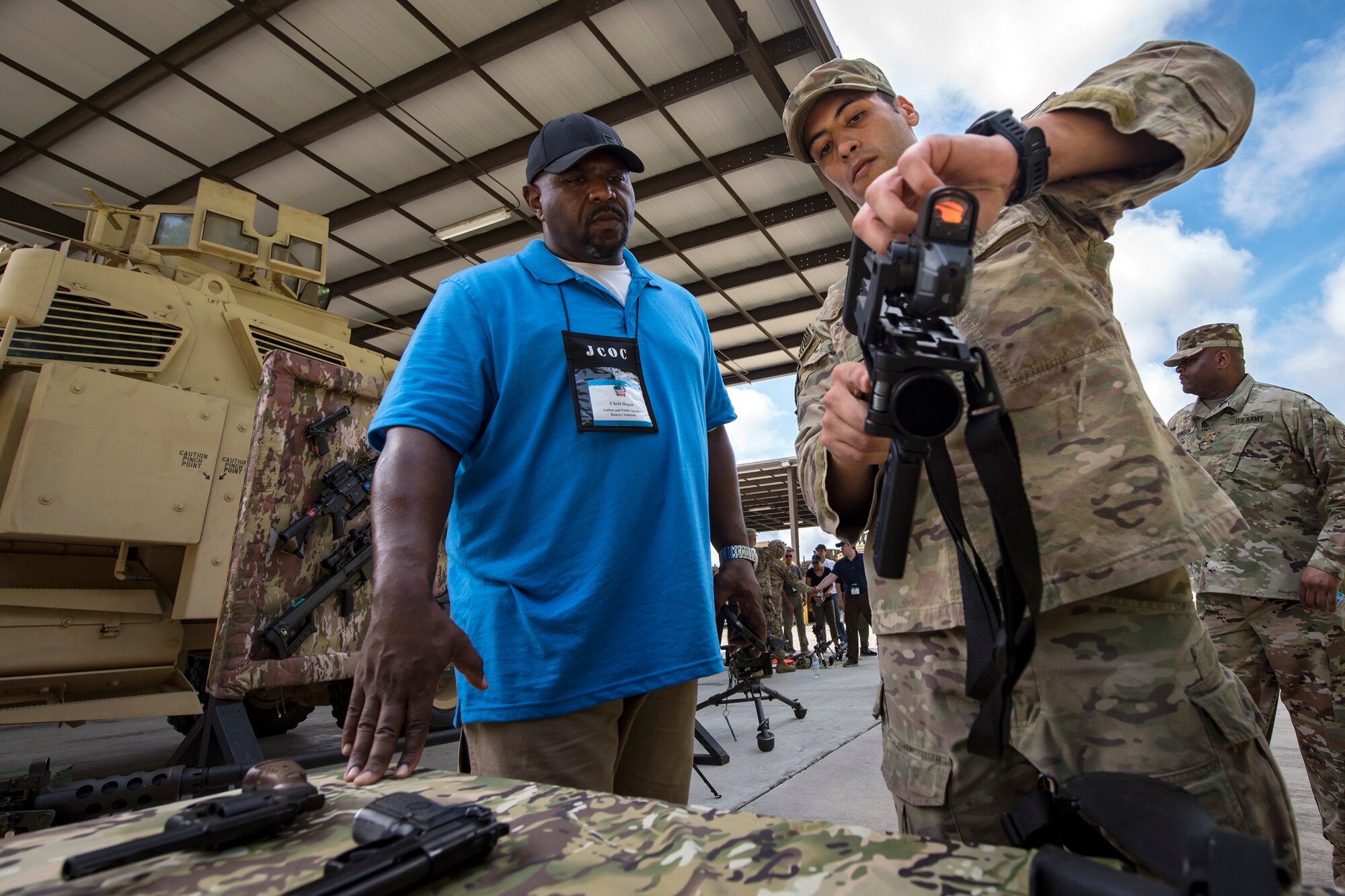 Staff Sgt. Kyle Rosenberg, 822d Base Defense Squadron fire team member, shows the components of an M4 Carbine to Chris Hogan, Joint Civilian Orientation Course 88 participant, June 13, 2018, at Moody Air Force Base, Ga. The mission of JCOC is to increase the public’s understanding of the military through engagements between the armed forces and course members. (U.S. Air Force photo by Airman 1st Class Eugene Oliver)