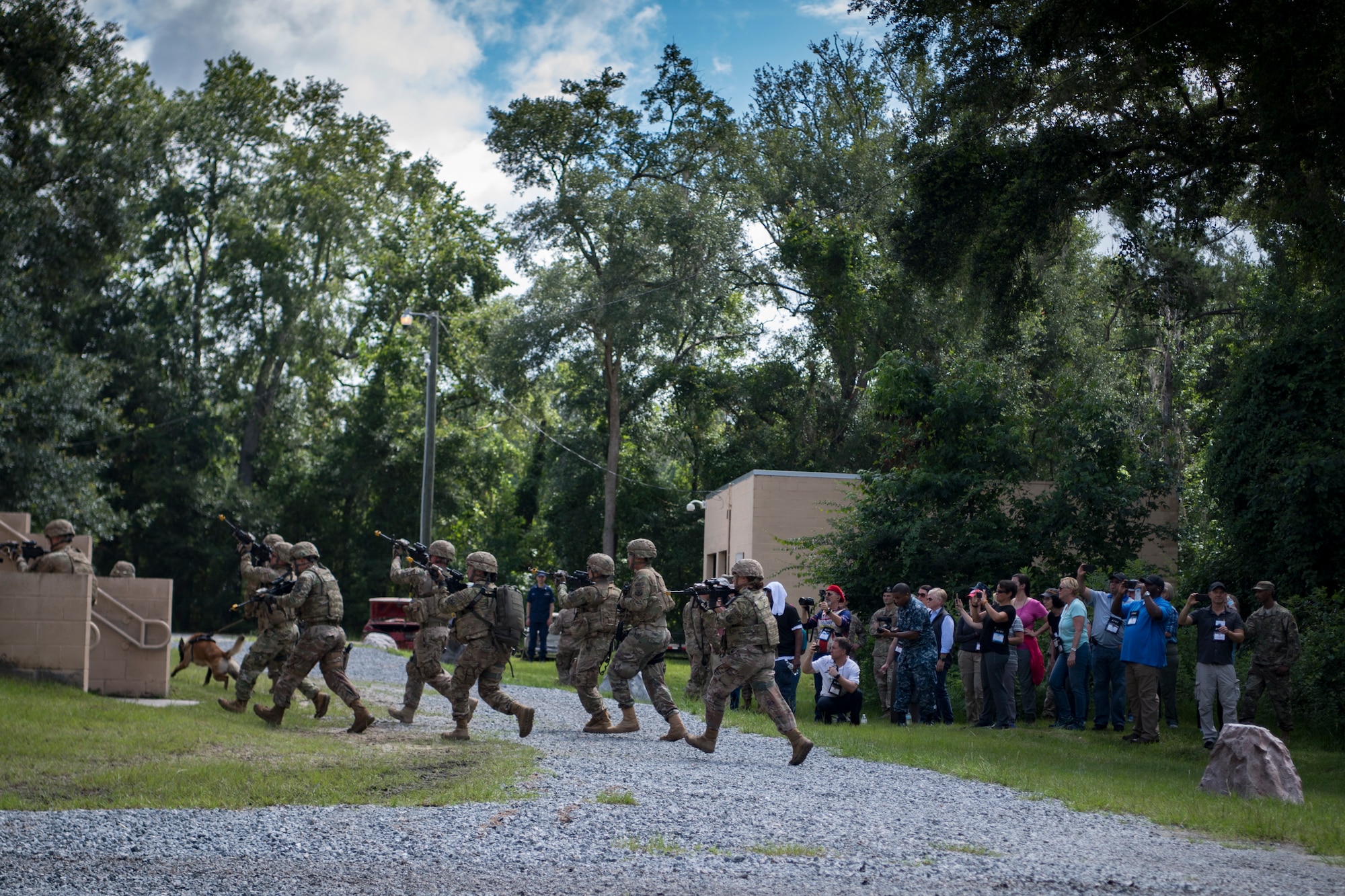 Members of the Joint Civilian Orientation Course 88 (JCOC) watch as Airmen from the 820th Base Defense Group conduct a capabilities demonstration, June 13, 2018, at Moody Air Force Base, Ga. The mission of JCOC is to increase the public’s understanding of the military through engagements between the armed forces and course members. (U.S. Air Force photo by Senior Airman Daniel Snider)