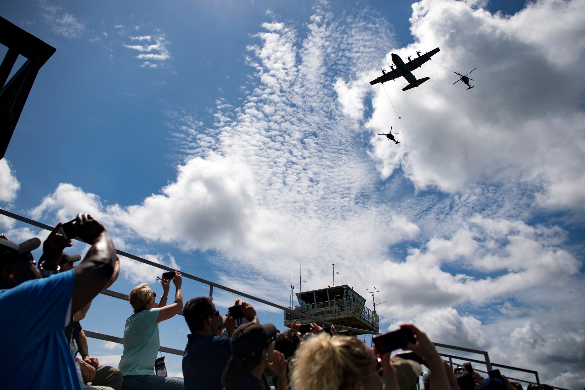 Members of the Joint Civilian Orientation Course 88 (JCOC) watch as Airmen from the 347th Rescue Group conduct refueling operations during a capabilities demonstration, June 13, 2018, at Moody Air Force Base, Ga. The mission of JCOC is to increase the public’s understanding of the military through engagements between the armed forces and course members. (U.S. Air Force photo by Senior Airman Daniel Snider)